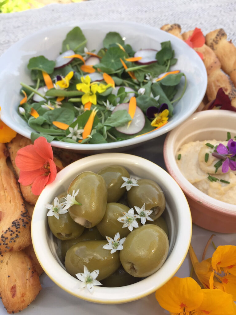 Garlic chives edible flowers and garlic olives
