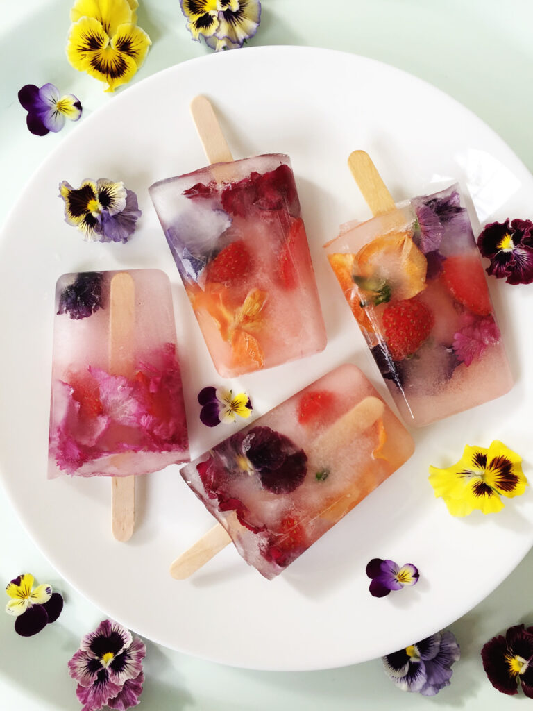 Edible flowers and fruit ice lollies