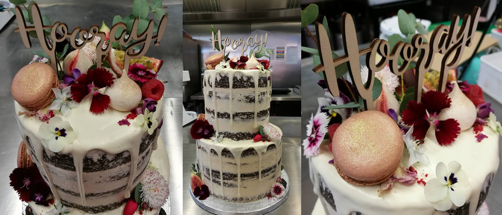 Our edible flowers used on a celebration cake by Amy Fish