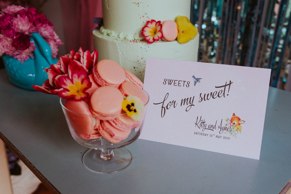 Edible flowers with wedding dessert macarons